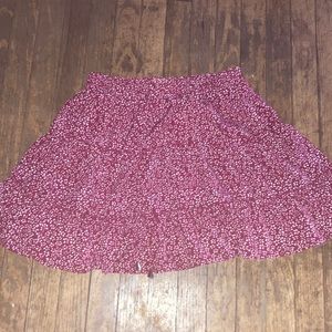 red skirt with white flowers